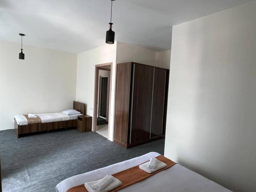 Postel nebo postele na pokoji v ubytování Guest House Nikola