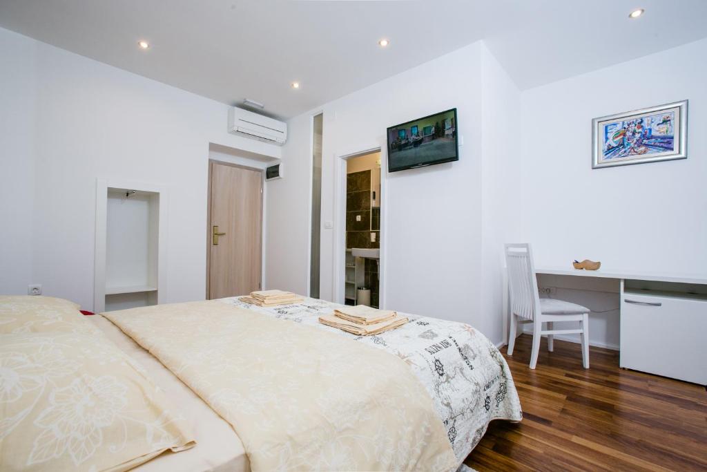 Posteľ alebo postele v izbe v ubytovaní Guesthouse Old Mulberry
