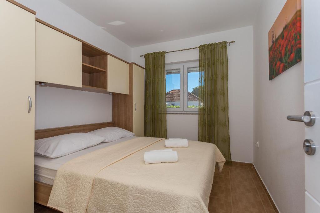 Posteľ alebo postele v izbe v ubytovaní Villa Caper