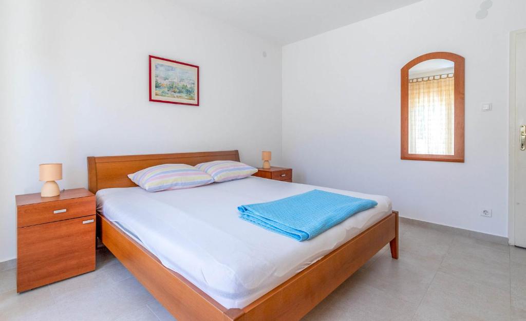 Postel nebo postele na pokoji v ubytování Apartment Lea