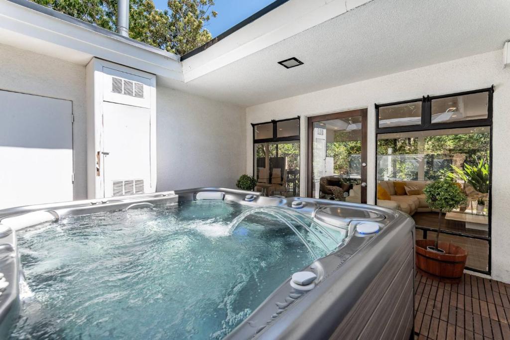 a jacuzzi tub in the middle of a house at Multiview Manor in Los Angeles