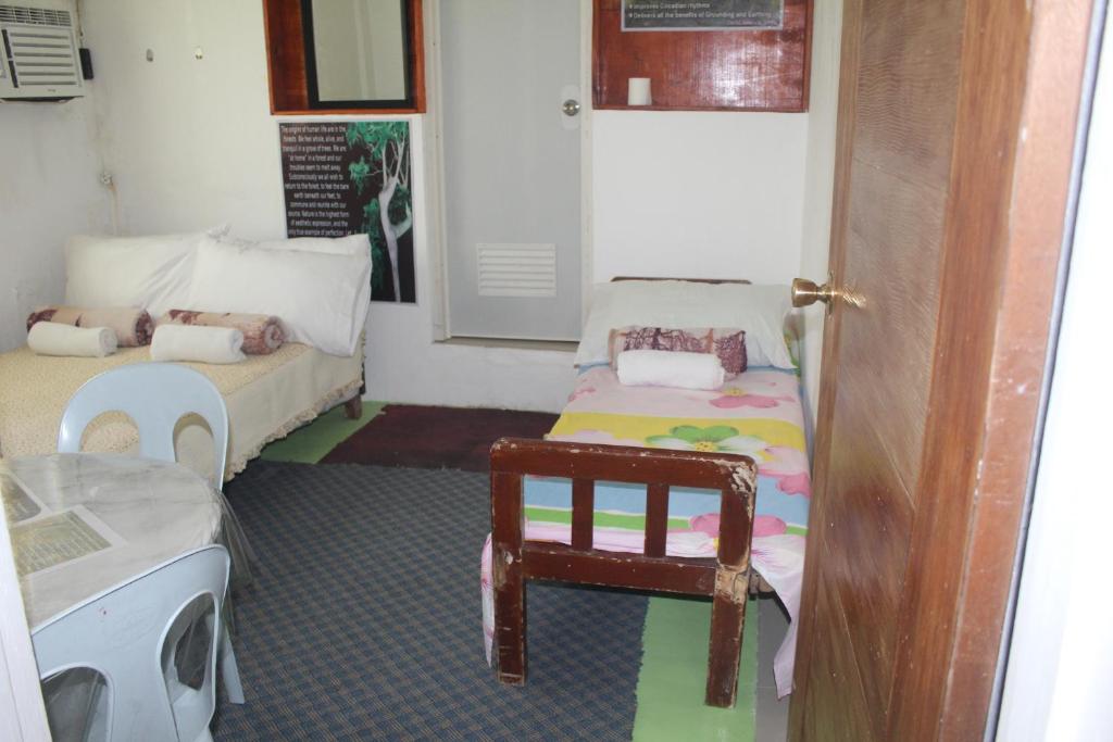 Postel nebo postele na pokoji v ubytování Maraño's Home