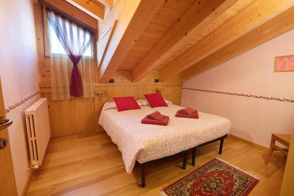 Posteľ alebo postele v izbe v ubytovaní Baita dei ski app 6