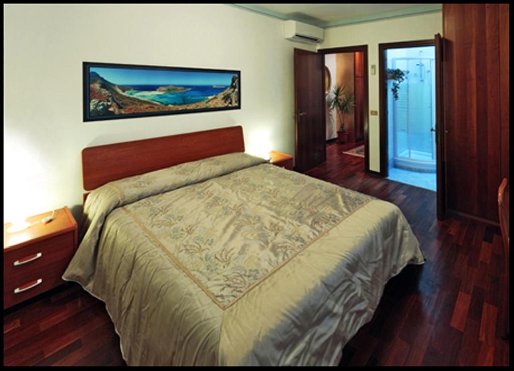 Een bed of bedden in een kamer bij B&B Oasi di Venezia