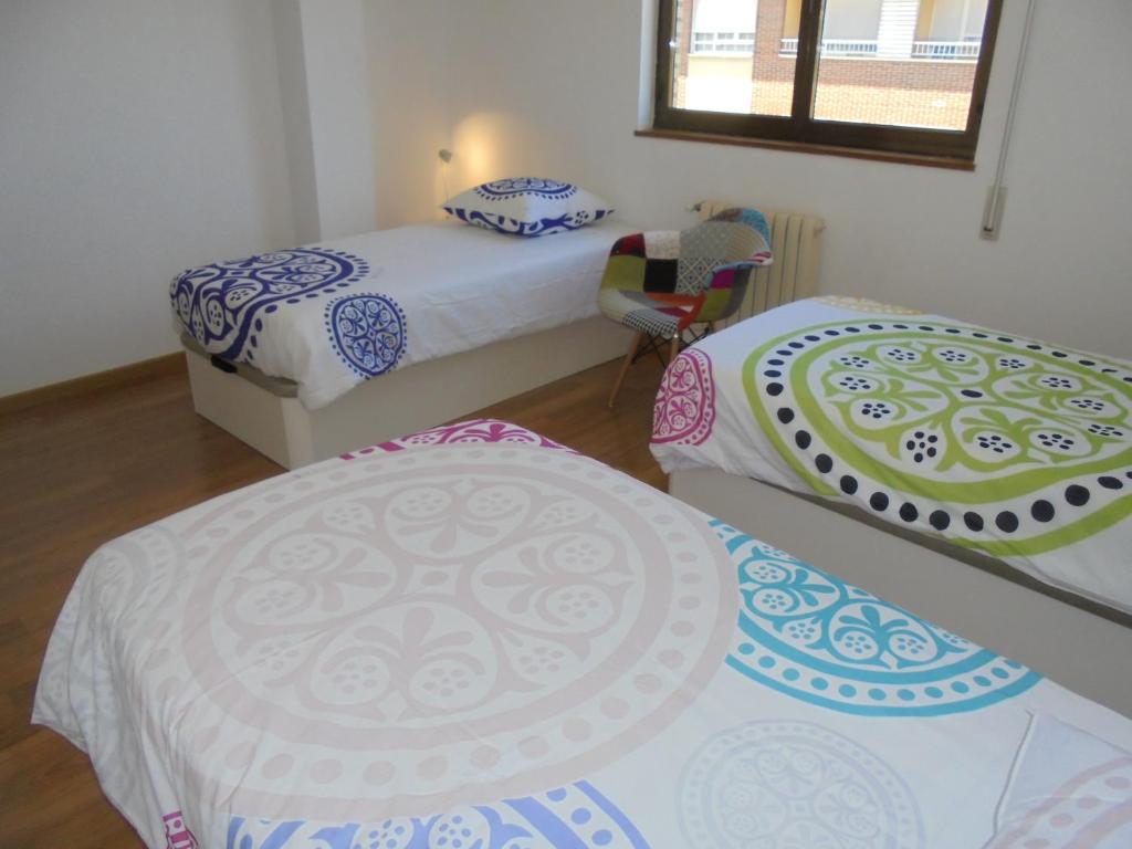 Posteľ alebo postele v izbe v ubytovaní Jaen Apartment