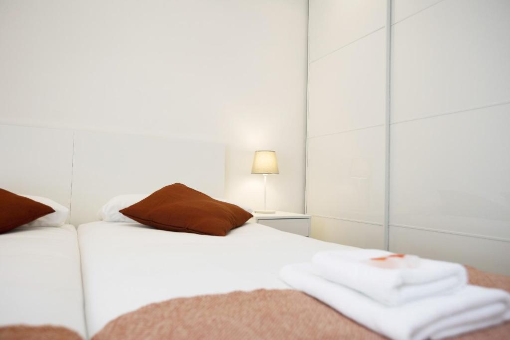 Posteľ alebo postele v izbe v ubytovaní Haizea by Smiling Rentals