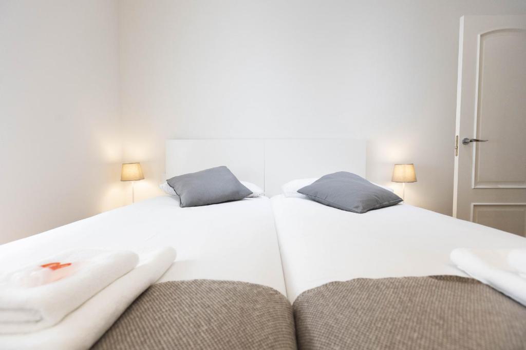 Posteľ alebo postele v izbe v ubytovaní Haizea by Smiling Rentals