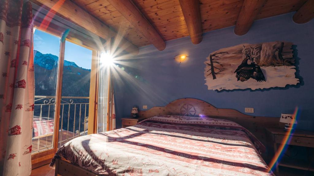 Postel nebo postele na pokoji v ubytování Agriturismo Belotti