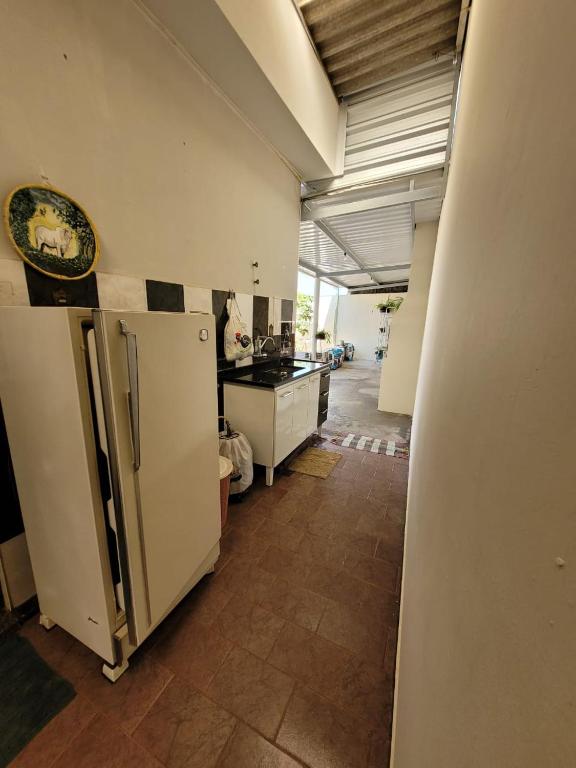 Kuchyň nebo kuchyňský kout v ubytování Casa de Temporada Piumhi