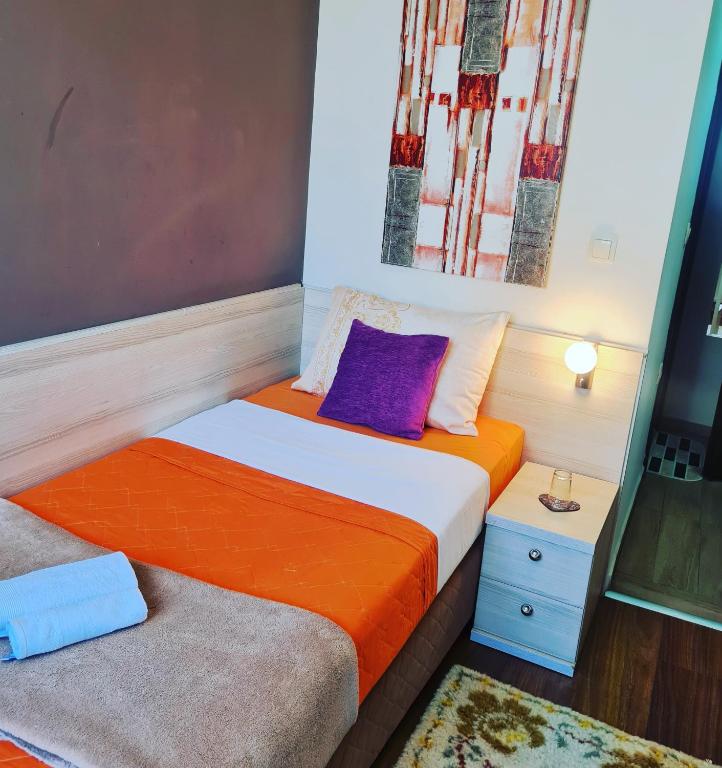 Postel nebo postele na pokoji v ubytování Hotel Bulevar