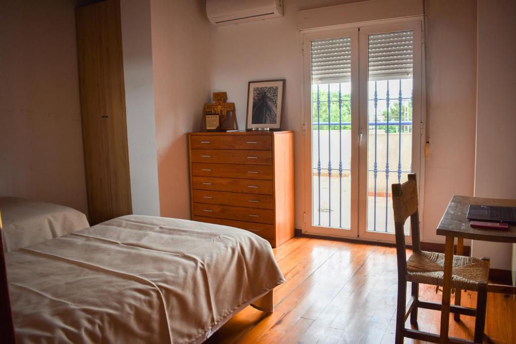 A bed or beds in a room at Salvadora Luminosa