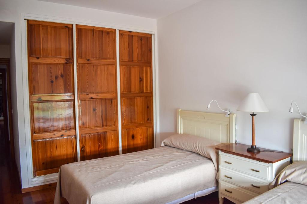 A bed or beds in a room at Salvadora Luminosa