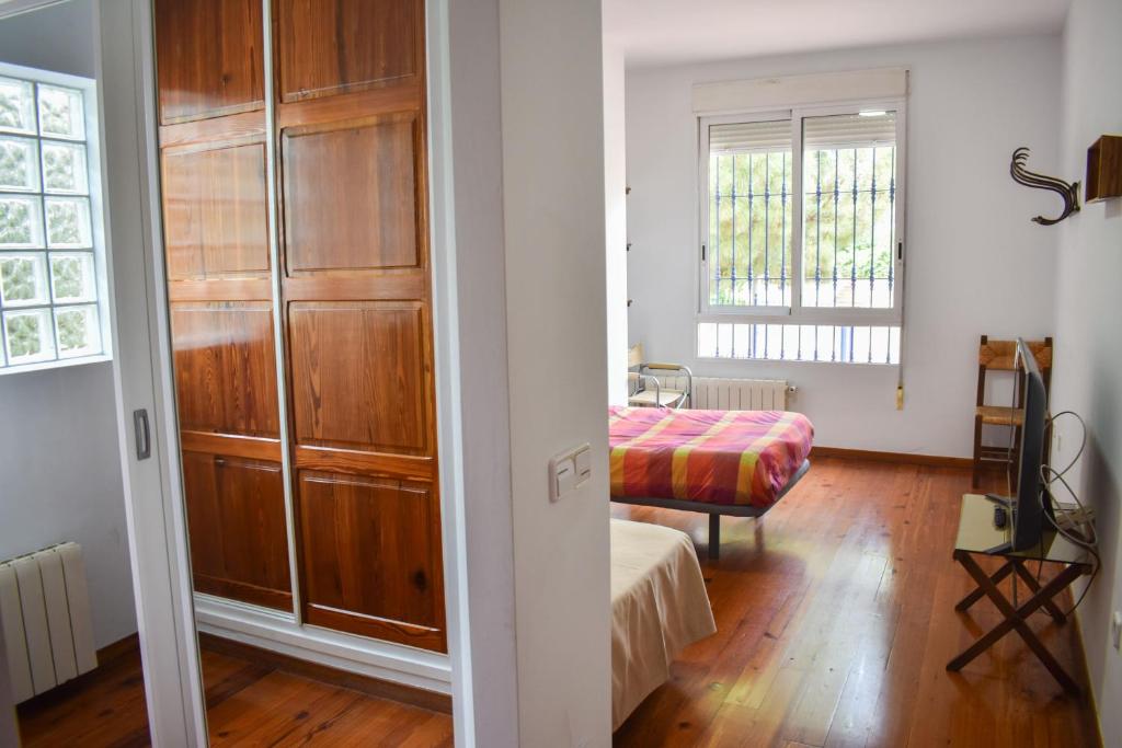 A bed or beds in a room at Salvadora Luminosa