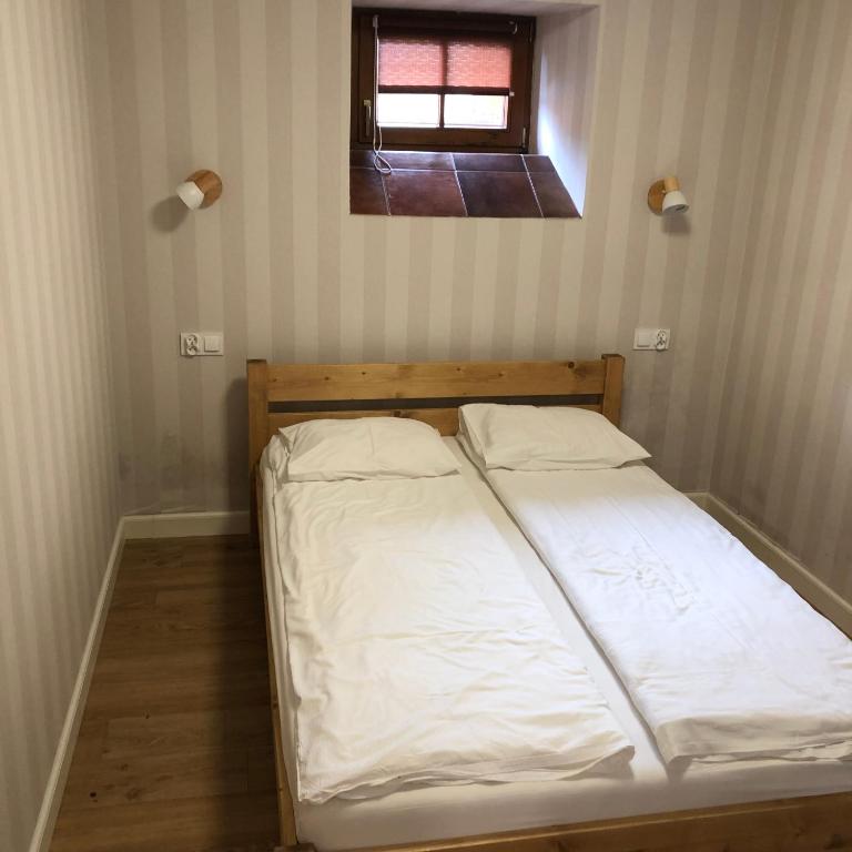 Posteľ alebo postele v izbe v ubytovaní Śnieżka
