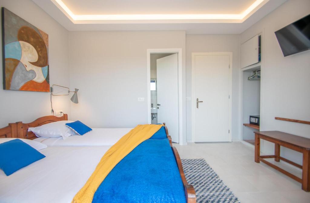 Voodi või voodid majutusasutuse THIRES Guesthouse toas