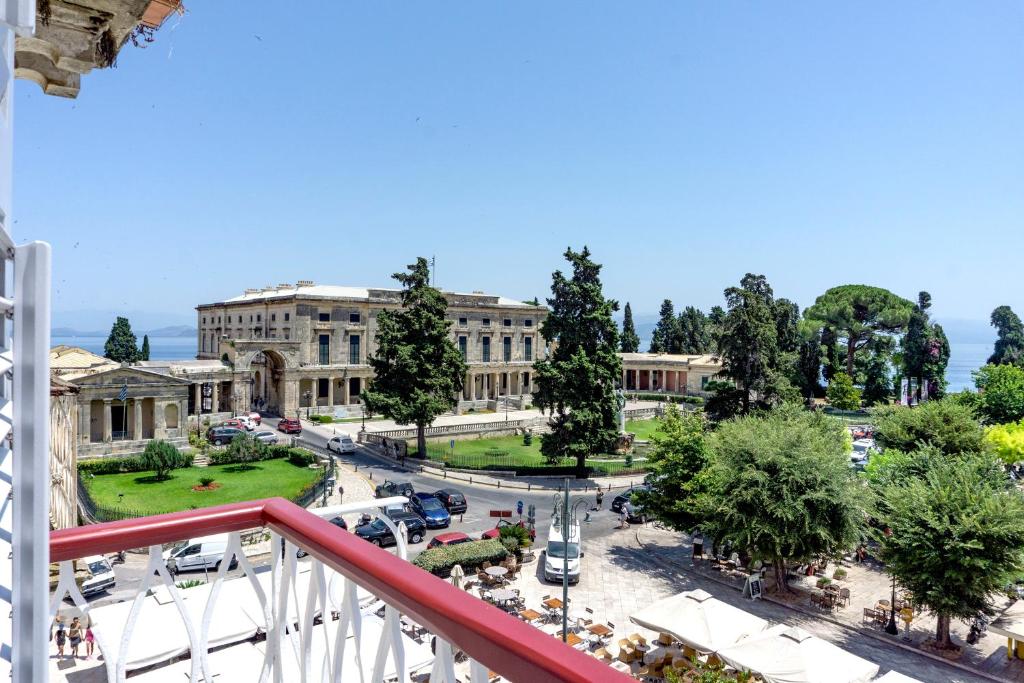 a view from a balcony of a building with a park at Casa Rosina in Corfu Town