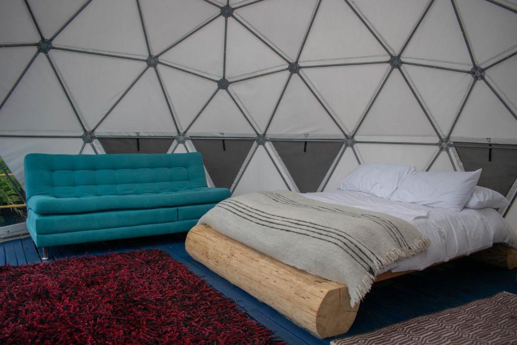 Postel nebo postele na pokoji v ubytování La Meca Glamping