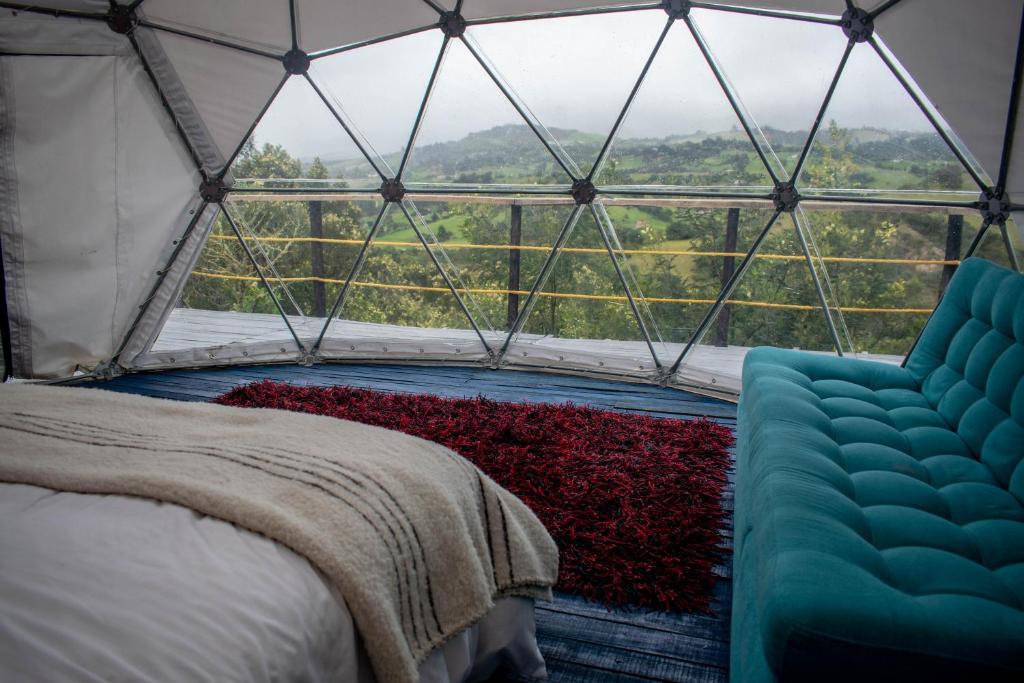 Posezení v ubytování La Meca Glamping