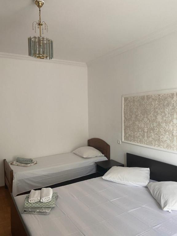 Postel nebo postele na pokoji v ubytování Badu Guest House