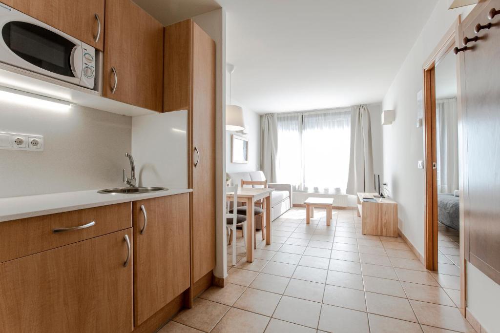 Η κουζίνα ή μικρή κουζίνα στο Outdoor Apartaments - Ski