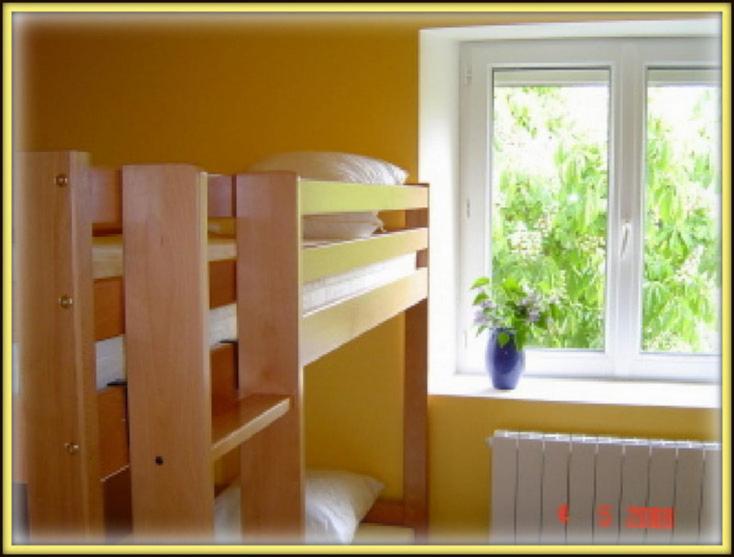 Postel nebo postele na pokoji v ubytování Gîte de la chanal 07