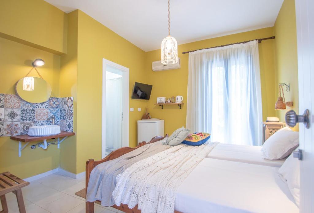 Voodi või voodid majutusasutuse THIRES Guesthouse toas