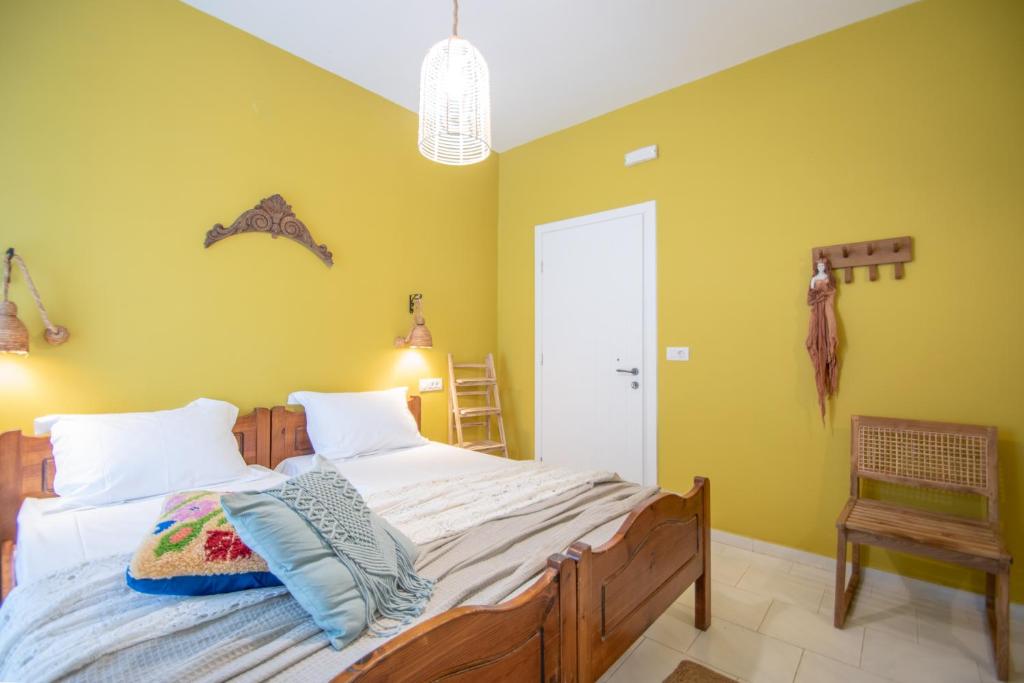 Voodi või voodid majutusasutuse THIRES Guesthouse toas