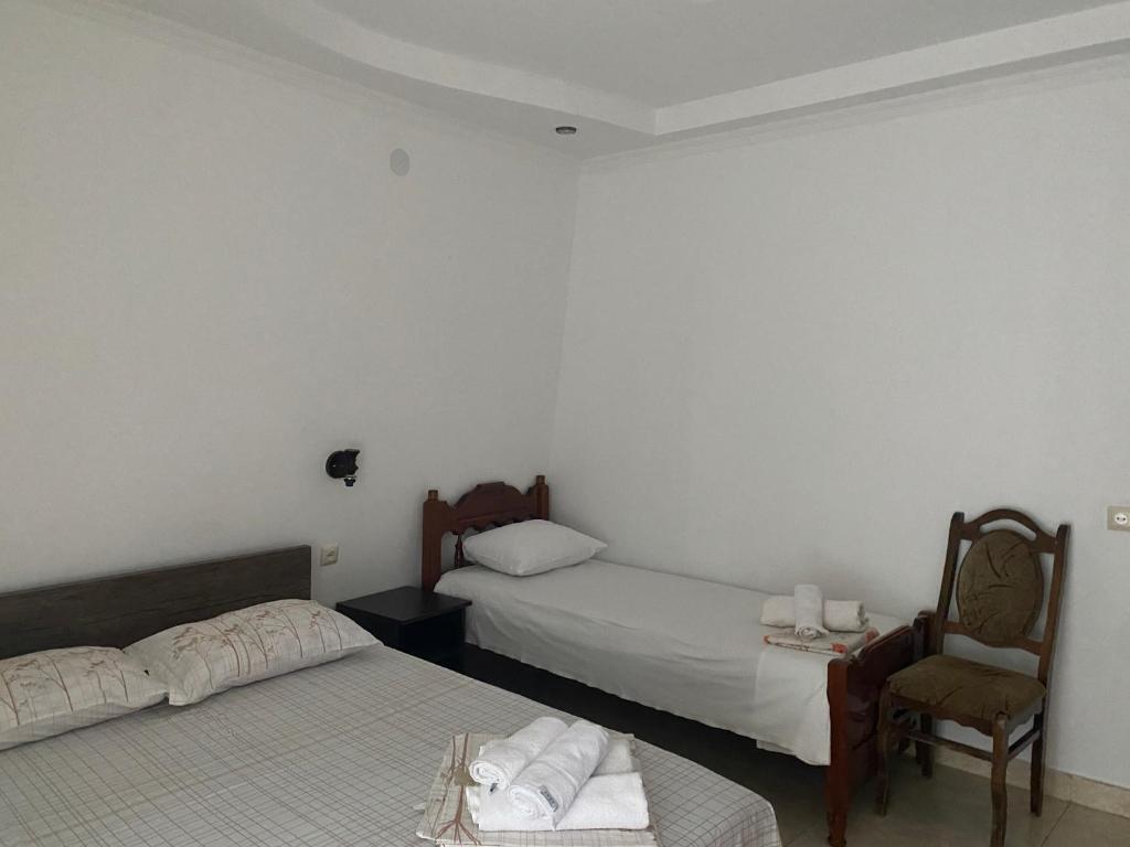 Postel nebo postele na pokoji v ubytování Badu Guest House