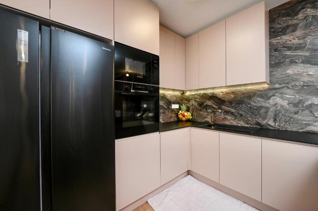Kuchyňa alebo kuchynka v ubytovaní S design apartment