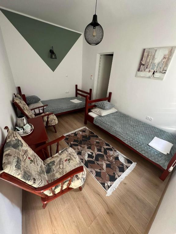 Postel nebo postele na pokoji v ubytování Guest House Time Out