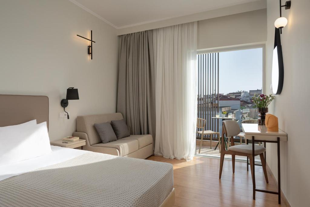 Posteľ alebo postele v izbe v ubytovaní Preveza City Comfort Hotel