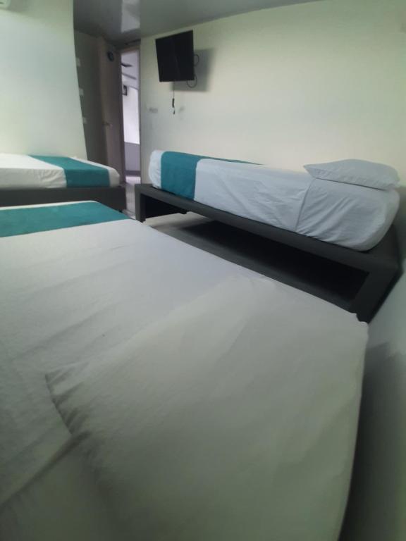 Postel nebo postele na pokoji v ubytování Sky view hotel tolu