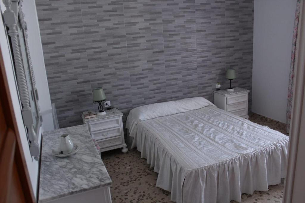Postel nebo postele na pokoji v ubytování Casa La Maceta