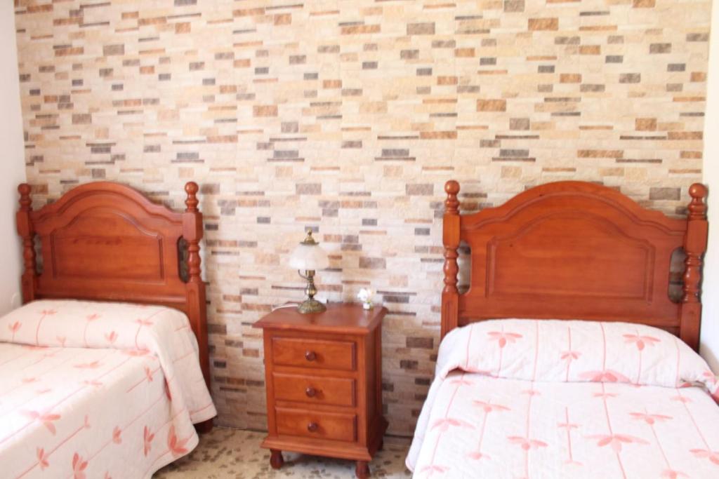 Postel nebo postele na pokoji v ubytování Casa La Maceta