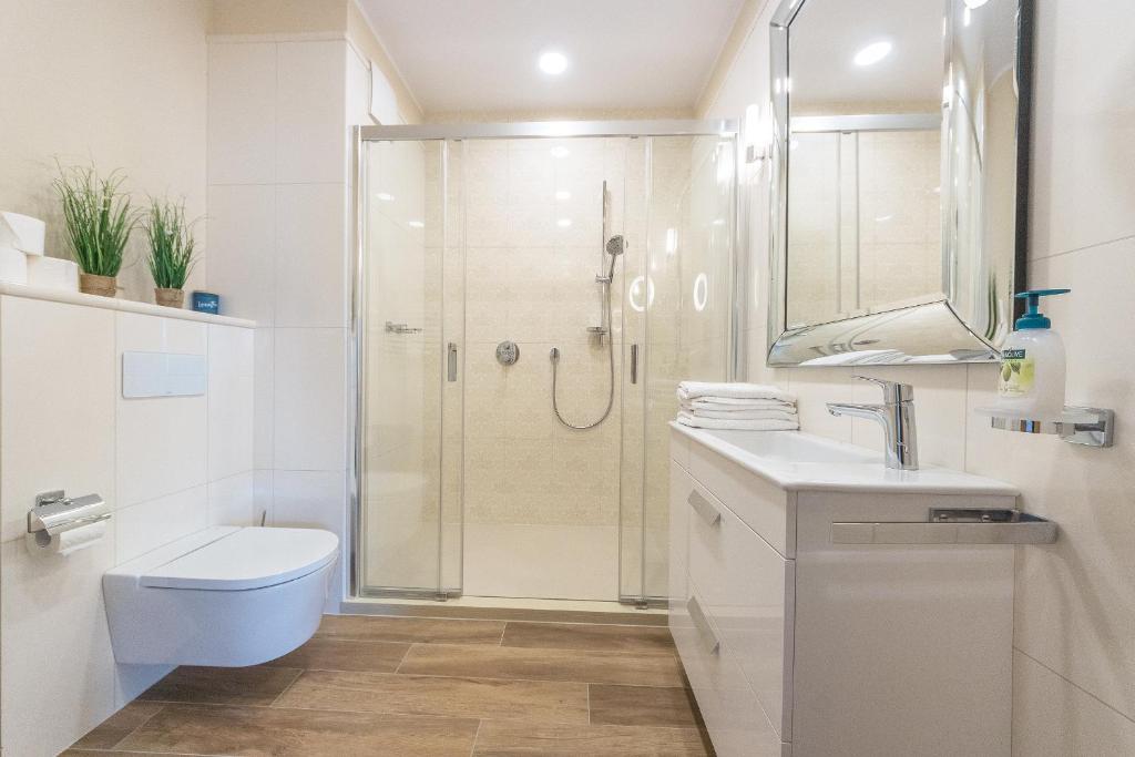 Łazienka w obiekcie Pomorskie Apartamenty Bernadowska Green Deluxe