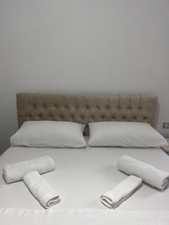Postel nebo postele na pokoji v ubytování Fiori Rooms