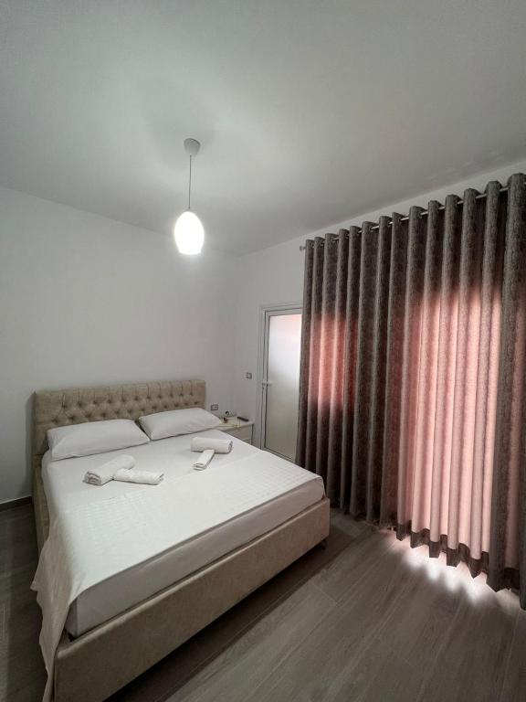 Postel nebo postele na pokoji v ubytování Fiori Rooms
