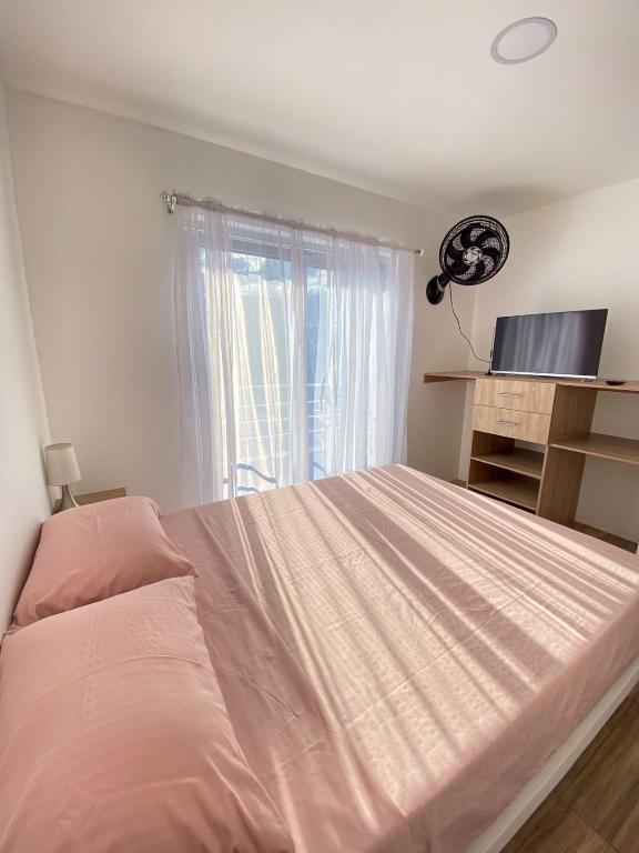 Postel nebo postele na pokoji v ubytování HOTEL EBENEZER