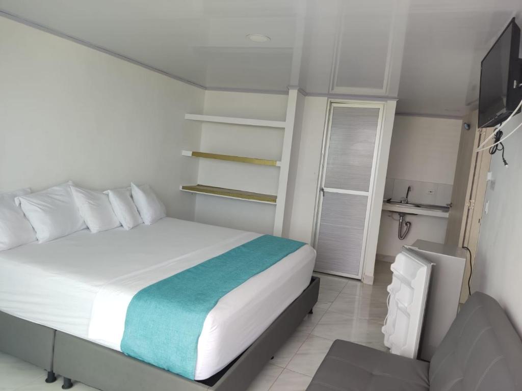 Postel nebo postele na pokoji v ubytování Sky view hotel tolu