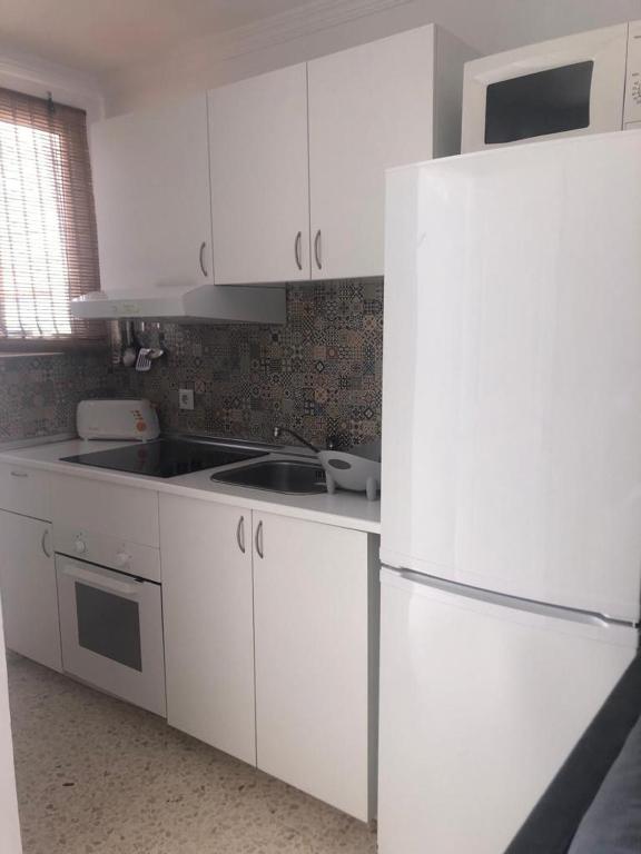 A kitchen or kitchenette at Sanpau