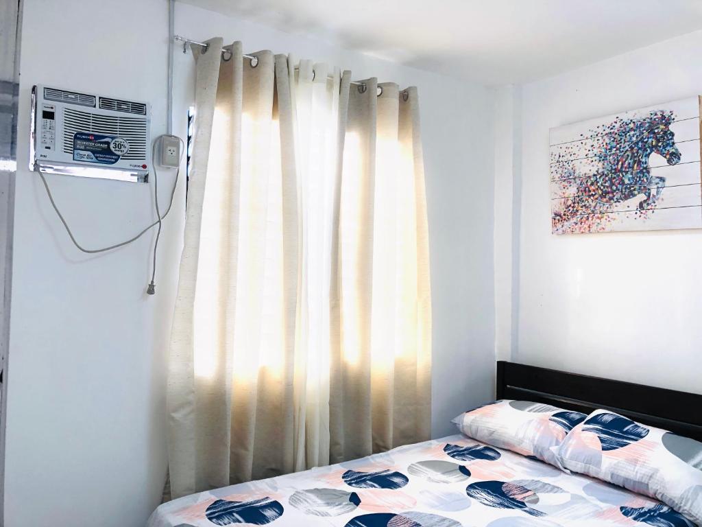 Een bed of bedden in een kamer bij P&Y 114 House for rent