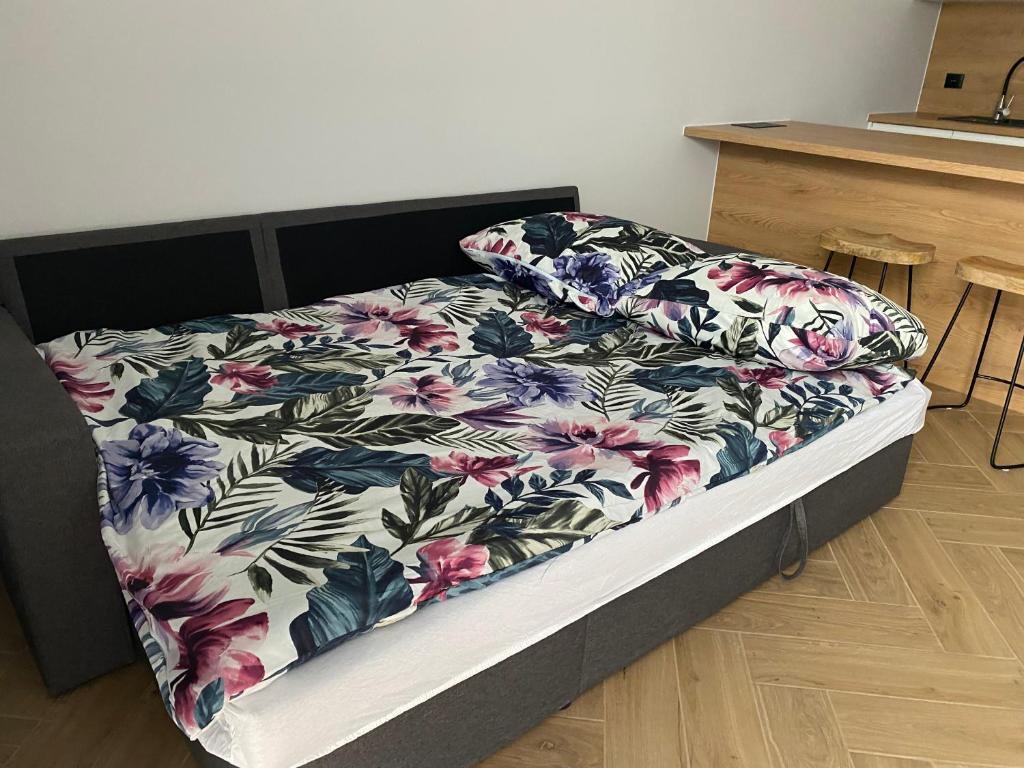 Posteľ alebo postele v izbe v ubytovaní Apartament Aleja Centrum Białystok