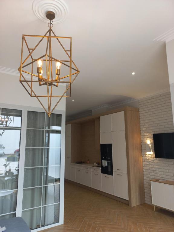 TV a/nebo společenská místnost v ubytování Topaz Apartamenty