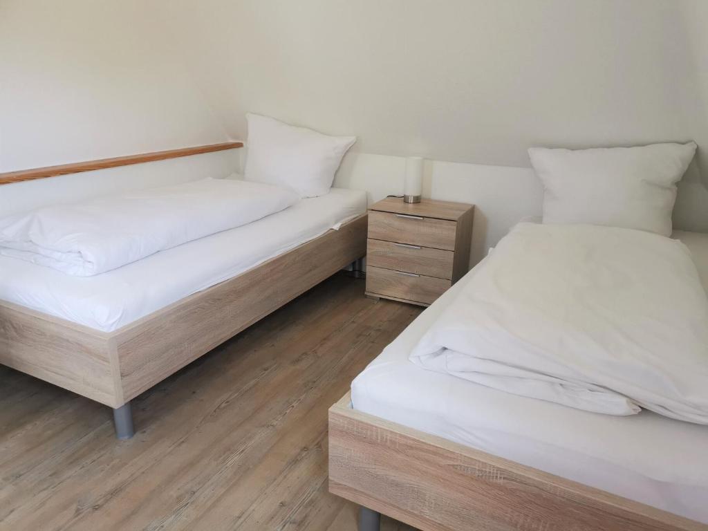 Postel nebo postele na pokoji v ubytování Haus Elbestraße 24 Elbestraße 24, Whg OG
