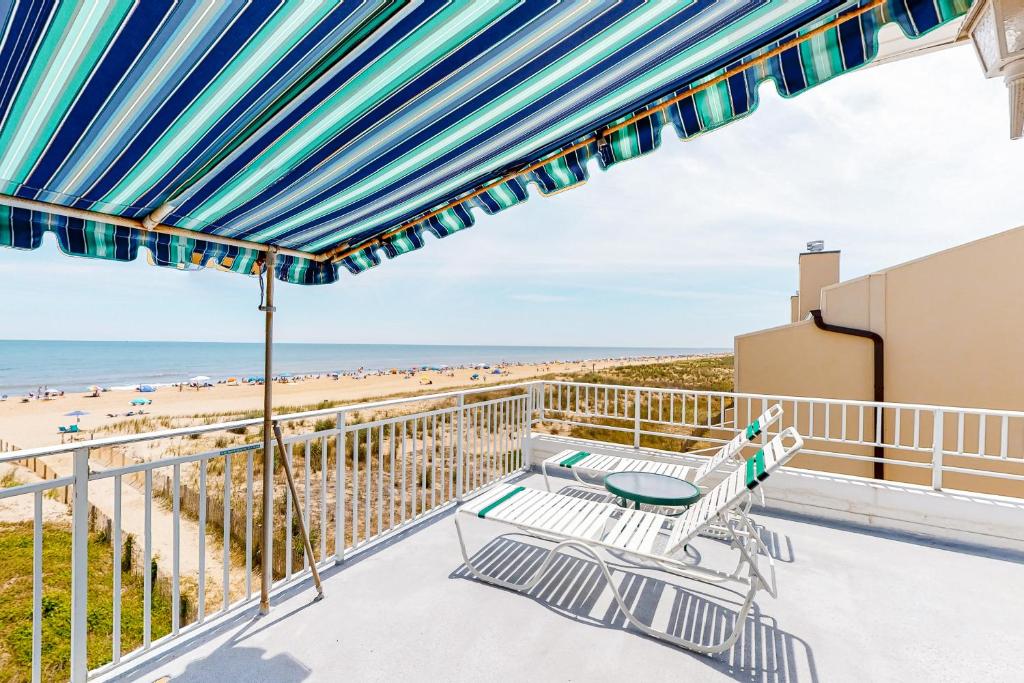 a balcony with a view of the beach at Wight Street - Unit 2 in Ocean City