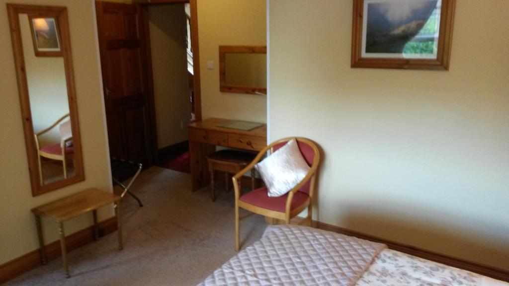 Postel nebo postele na pokoji v ubytování Ballyraine Guesthouse
