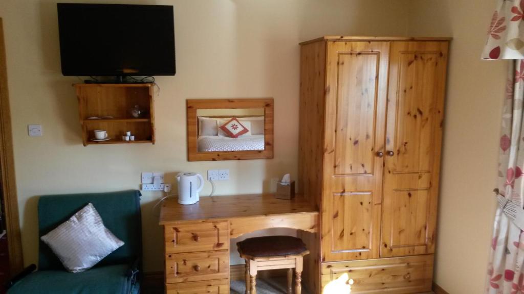 TV a/nebo společenská místnost v ubytování Ballyraine Guesthouse