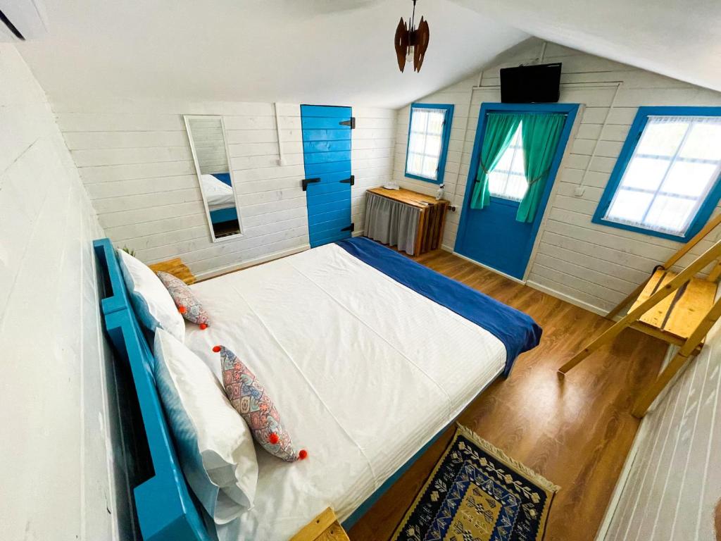 Postel nebo postele na pokoji v ubytování Manu B&B