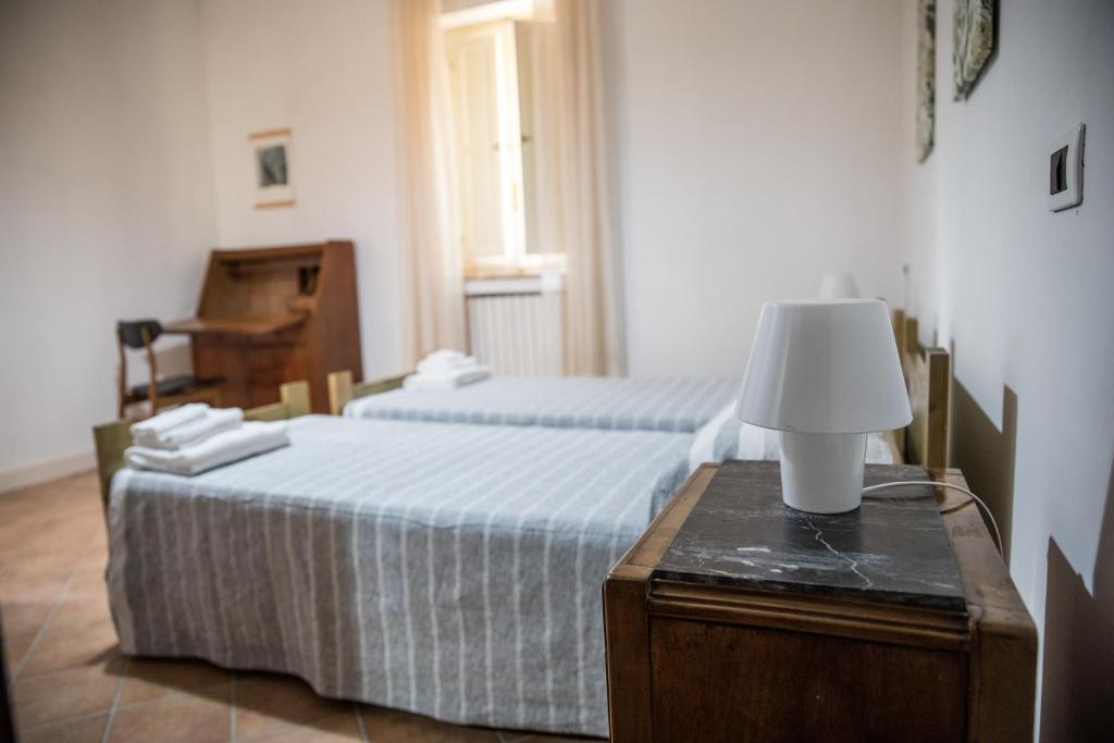 Postel nebo postele na pokoji v ubytování Casale De Filippo