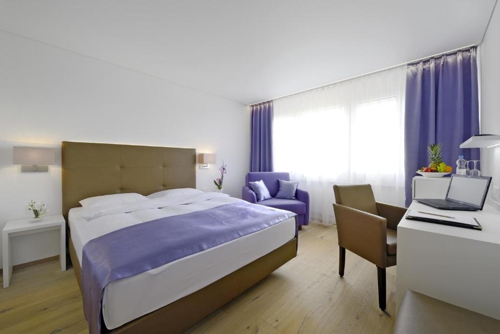 Postel nebo postele na pokoji v ubytování Hotel Al Ponte